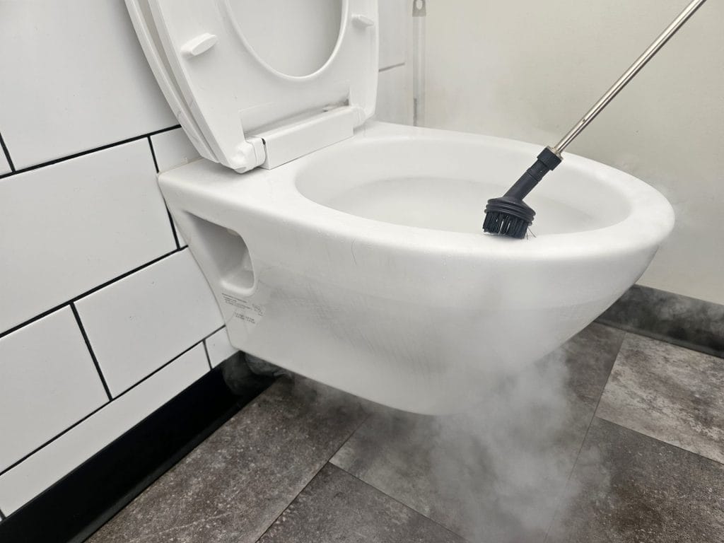 High pressure steam cleaning commercial toilet and restroom sanitization by Angst Cleaning Lehigh Valley PA