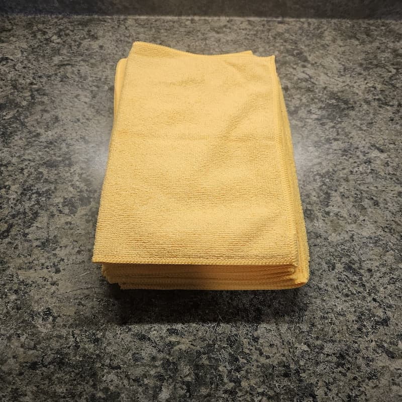 Yellow color-coded microfiber cloths designated for office surface and desk cleaning Angst Cleaning Lehigh Valley PA